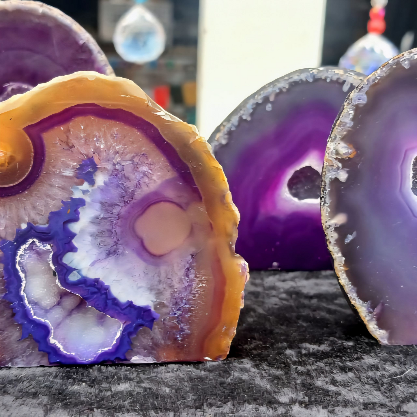 PURPLE COLOURED AGATE GEODE WITH BASE